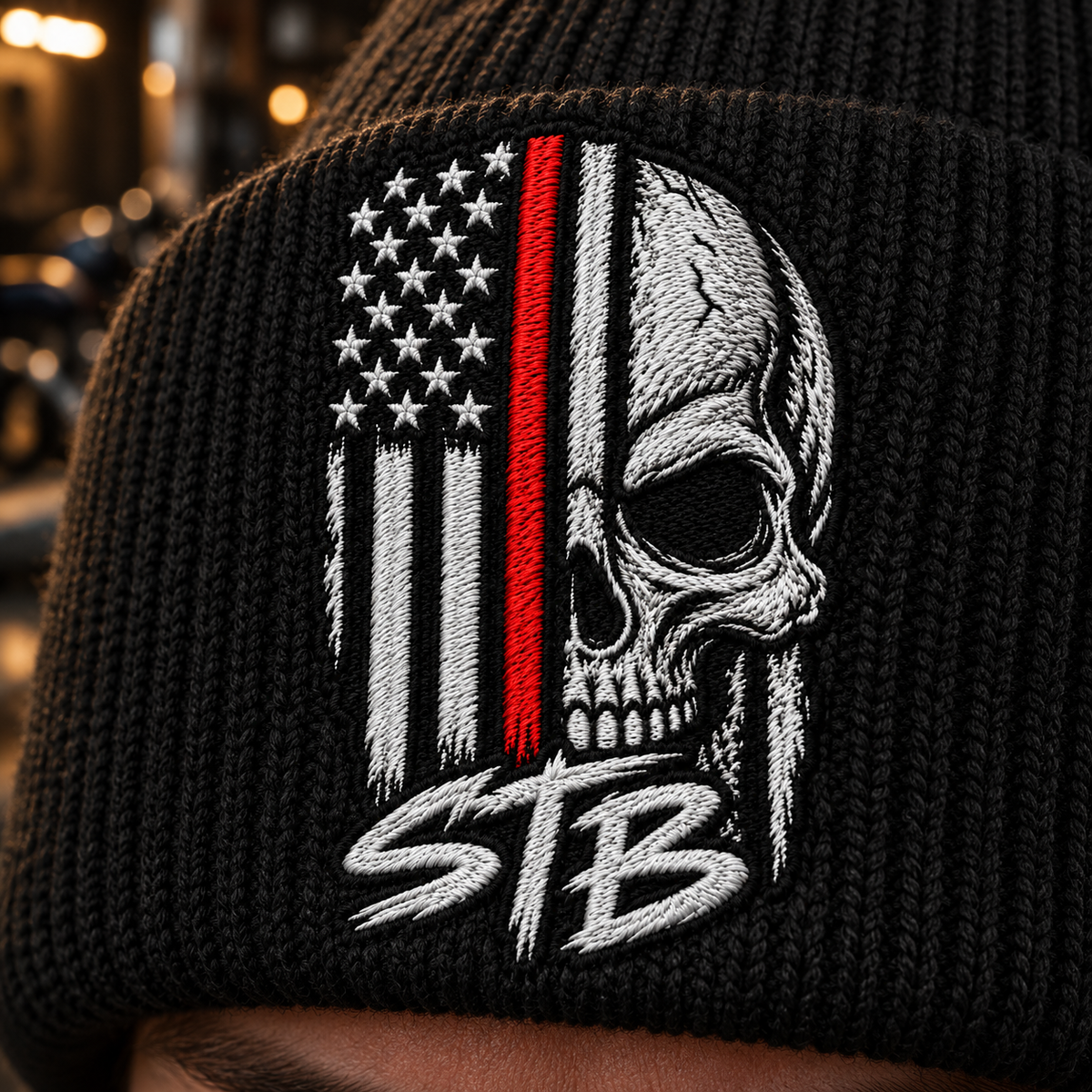     Close-up of STB American flag skull embroidery on black beanie